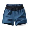 Ueteey Men Sport Shorts Full Pocket Casual Trail Trail Retabless Arthable Dry Dry Marathon Gym Joging Tennis Athletic 240402
