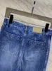 Fashion de jeans pour femmes pour femmes doubles poches patchwork hauts hauts pantalons en denim à jambe droite printemps été 2024 marée ax59