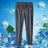 Pantalon de soie de glace pour un pantalon décontracté sports de séchage rapide d'été pour hommes pour les jeunes masculins lâche et drapage 9/4 pantalon de climatisation