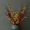 Dekorativa blommor livtro röda fruktförmögenhet Acacia Bean Holly Artificial Flower Ideal för årsfirande