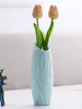 Vasen Plastik Vase einfache kleine Blütenstopflagerblumen Wohnzimmer moderne Heimdekoration Ornamente