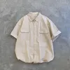 Blouses pour femmes kusahiki à manches courtes à manches courtes à manches de style safari causale Collier de remin-down coréen 2024 Été solide Blusas fémininas élégantes