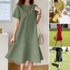 Festklänningar Kvinna O-hals blixtlås Kort ärm Sundress Summer Woman Solid Dress Stylish Elegant Work Vintage Loose Midi