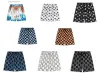 Shorts de grife rhude shorts calças de praia de moda de verão masculino de alta qualidade masculina desgaste de rua vermelho, azul, preto e roxo Long Long