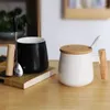 Tasses tasse de café en céramique avec cuillère de couvercle simple nordique en bois manche de bureau couple couture de tasse d'eau personnalisation