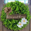 Decoratieve bloemen kerstkrans muur hangende nepplant eucalyptus kleine frisse typeplaatje deur groen planten groothandel