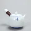 Juntos de té de té de porcelana blanca Copas azules y de cerámica con bandeja