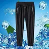 Pantalon de soie de glace pour un pantalon décontracté sports de séchage rapide d'été pour hommes pour les jeunes masculins lâche et drapage 9/4 pantalon de climatisation