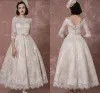 Abiti abiti da sposa in pizzo 2020 Vintage Bateau Champagne Mezzo manica Abito da sposa A Dreption Bridal Lunghezza da tè senza schiena