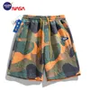 NASA CO marca shorts masculinos de camuflagem Carta Jacquard Casal Calças de cinco polegadas Praça de praia esportes soltos