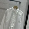 Kvinnors blusar En nischdesign för skjortor College Style Löst passande avslappnad skrynklig dekoration Långärmad vit skjorta