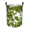 Sac à linge Panier circulaire des feuilles vertes avec poignée portable Boîte de chambre à coucher de rangement imperméable Boîte de chambre petite et moyenne
