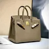 Sac en cuir haute définition sac de qualité du sac de qualité Tempérament pour femmes en cuir portable portable motif en lit haut de gamme haut de gamme togo vache en cuir pour femmes en cuir