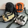 مصمم Carhartbag Bag Carha Day Packs أحادية الكتف حقيبة عمل ملابس عبر الهاتف المحمول عبر الهاتف المحمول من الذكور والطالب الرياضي الترفيهي اتجاه مربع صغير