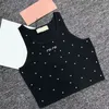 2024 Designers Women's Tops Tees Tanks Camis Chest Letter Shirt Tank Top Pärled Kort Vest Fashion Clothle Play Pock Sexig T Shirt CC Crop Top Beach Wear Suit Vest Party L L