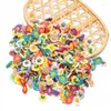 Fleurs décoratives 50 pcs / sac 4cm mélange en soie tournesol floraison artificielle à la maison décoration accessoires de scrapbooking accessoires couronne de bricolage faux