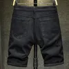 Летние белые черные мужчины разорванные отверстия джинсовые шорты Тонкие повседневные длины колена Короткие прямые джинсы шорты Бермудские острова для мужчин 240402