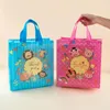 Sacs de rangement Stobag 12pcs Paquet cadeau Tot Fabric non tissé merci pour les enfants anniversaire étanche à la poche réutilisable Favors