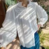 Blouses pour femmes bouffées de bouffées longues chemises blanches à manches longues pour femmes en dentelle coton boho chèque de vacances d'été décontracté.