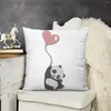 Cuscino panda e palloncini di lancio per divano