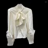 Blouses pour femmes 2024 Spring French Thory Chandon Fleur Decorative pour femmes Boutons de couleur de couleur à lacets à lacets à lacets