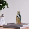 Jarrones Vasos de resina Pequeñas manualidades únicas Flower Plants Artificial Artificial para centro de mesa comedor decoración del hogar