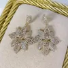 Kolczyki Dangle Luksusowe błyszczące pusta pustka liść długotrwały dla kobiet Crystal Crystal C African Dubai Bridal Earring A0179