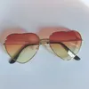 Nouvelles femmes Love Ocean Film Sunglasses Metal Peach Heart Fashion Fashion Enveloppe de coeur