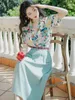 Arbetsklänningar Hong Kong -stiluppsättning kjol av kvinnlig 2024 sommar mode västerländsk krage skjorta kort ärm färsk grön