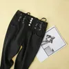 Le pantalon féminin porte le printemps et l'automne à poitrine simple croix haute taille élastique élastique mince mince petite noire