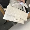 Les sacs à main designer vendent des sacs féminins à 50% de rabais sur le nouveau sac à bandoulière à épaule simple polyvalent.