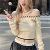 T-shirts pour femmes Sexy Struided Spoule Shoulder Long Sweater Sweater pour les femmes Rangée en tricot Tirover Crop Top