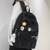 バックパックトレンディな女性男性メッシュバッジスクール女性ナイロンカレッジガール旅行バッグファッションメンズブックラップトップバッグ