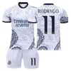 20232024 Real Madrid Football Outfit Dragon White Special Edition Cristiano Ronaldo training kit for children and adults