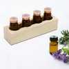 Boîtes de rangement La grille d'huile essentielle contient 4 bouteilles en vernis à ongles Stand Display Halder Organizer en bois Organisateur