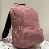 Sac à dos à dos haute capacité pour hommes et femmes sacs à dos de la mode Sac imperméable pour les femmes en nylon solide école de cabine de voyage