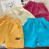 Trousers 2024 Summer Boys' Pants Girls' Shorts Quarter Korean Children's Middle Beach Kids Clothes