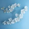 Haarclips Handgemaakte kammen witte keramiek bloem ontworpen bruid bruiloft bloemen hoofdbanden parels headpieces sieraden voor vrouwen feest