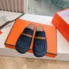 Fin printemps / été baotou Muller Slippers British British Shallow High Mouth une étape Design bas talon Denim moitié