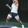 Anime Graphic 2 w 1 Szorty kompresyjne dla mężczyzn trening na siłowni działający z kieszeniami telefonicznymi Atletyczna szybka sucha odzież aktywna 240325