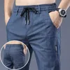 Jeans de seda de gelo para masculino Ultra-Fhin Summer Loose Straight Tube 2023 Novas calças casuais longas