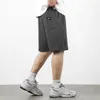 Herrbyxor skyddar en lapptäcke khaki casual shorts