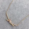 Дизайнерская бренда высокая версия ожерелье узла для женщин S925 Серебряное серебряное серебряное подвеска с высококачественной качественной костяной цепью с высокой 18-километрой золотой.
