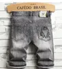 Fumaça de fada fumaça cinza mass de jeans 12 calças elásticas Slim Fit Fashion Hole Guy Jeans coreano angustiado 240328