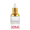 Garrafas de Essense atacado 30ml Goldper de vidro vazio de ouro para óleos essenciais Droga de garrafa transparente Drop Drop Office Business Indústria DHDCI