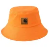 Vêtements de travail des pêcheurs de couleur unie, chapeau de bassin décontracté, marque de tendance d'été pour femmes, étiquette en cuir, sortie en plein air pour les couples, Sunshade Hat Trend