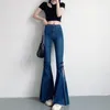 Kvinnors jeans 2024 Spring Blue Denim Flare Pants Women Korean Slim Fit Side Split Woman Vintage High midje Bow Mopping Trousers