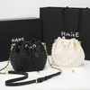 Sac en cuir Femmes 2024 Nouveau mini seau en cuir tiktok diamant petite chaîne de perles de parfum