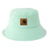 Vêtements de travail des pêcheurs de couleur unie, chapeau de bassin décontracté, marque de tendance d'été pour femmes, étiquette en cuir, sortie en plein air pour les couples, Sunshade Hat Trend