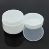 Bouteilles de rangement 50pcs / pack 50g pot crème contenant du maquillage en plastique blanc échantillon de cosmétiques coffre